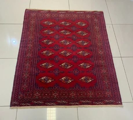 Sapphire navy Isfahan rug with central medallion and floral field
