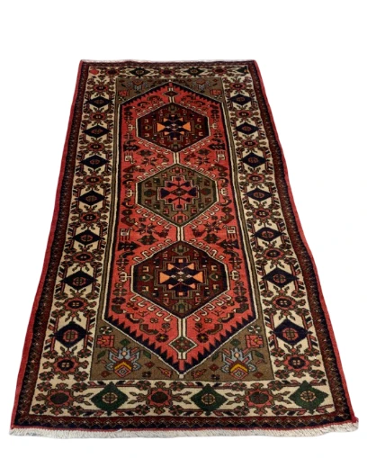 Rust red Hamedan rug with three hexagonal medallions