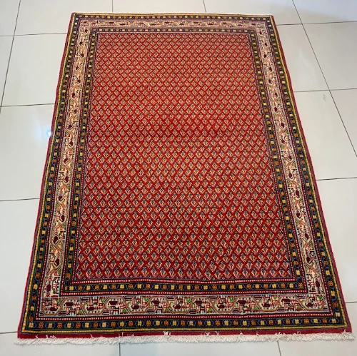 Navy Malayer rug with allover herati floral pattern