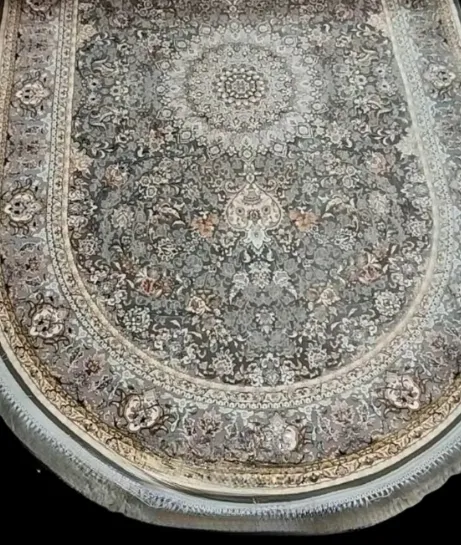 Persian machine-made oval rug