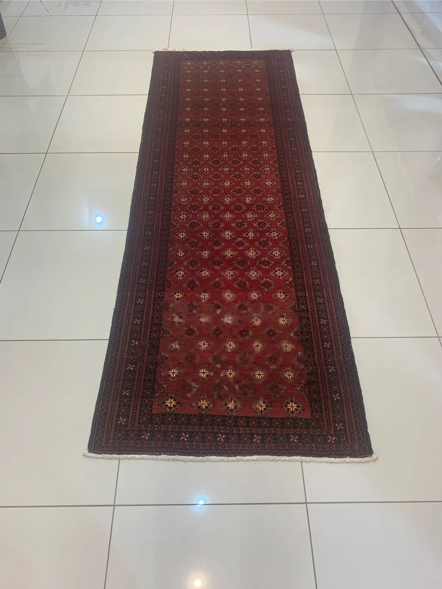 Balouch handmade runner rug with red diamond lattice pattern
