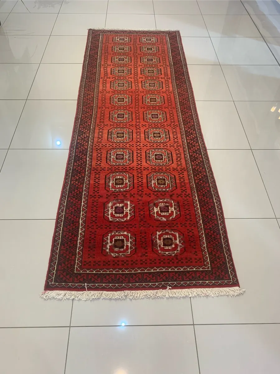 Balouch handmade runner rug with red medallion column pattern