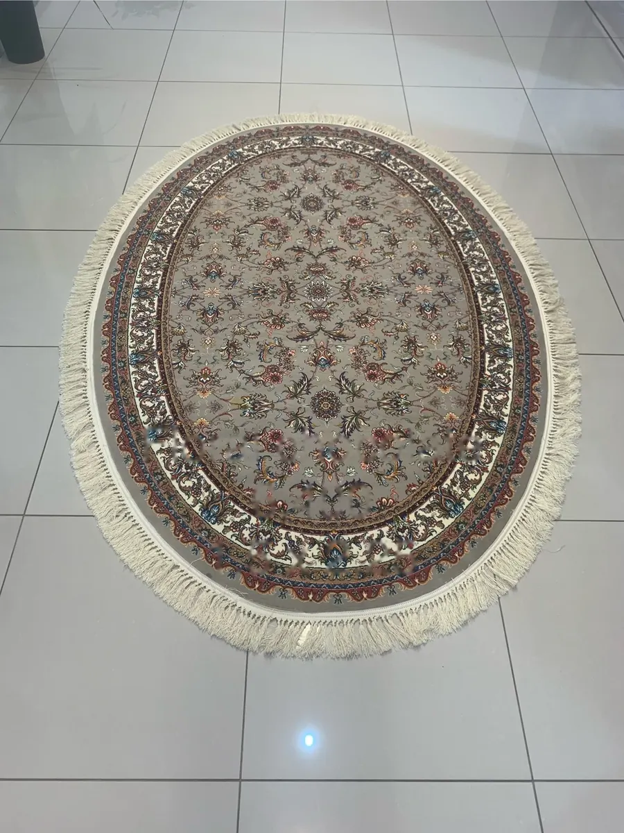 Oval Persian-style rug in taupe with floral medallion