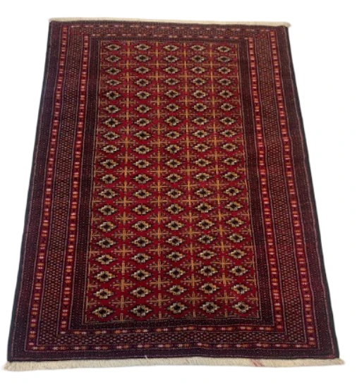 Rosewood red Bokhara rug with octagon medallion grid