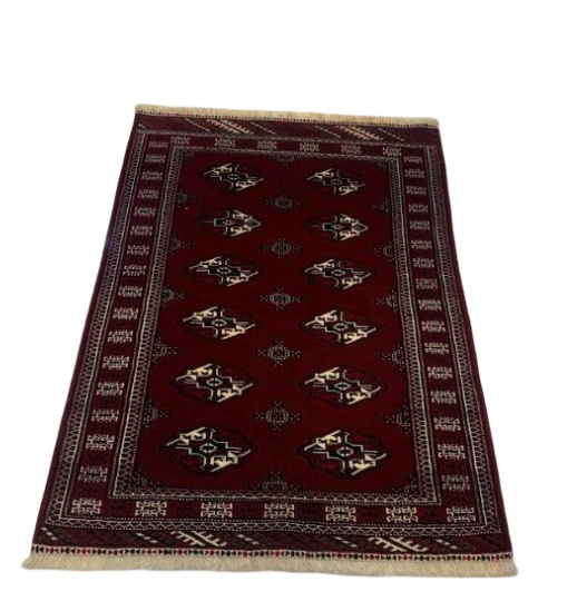 Navy blue Kashan style rug with dense floral pattern