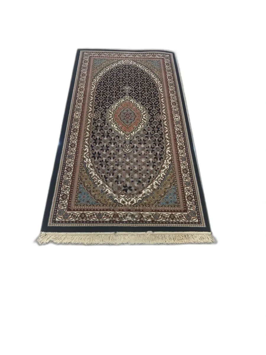 Ka Shan machine-made rug with navy medallion