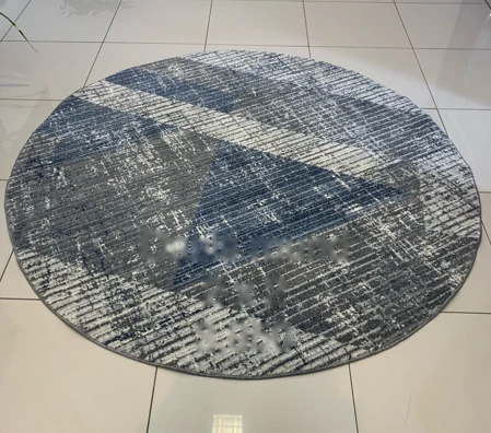 Round grey and blue diagonal abstract rug