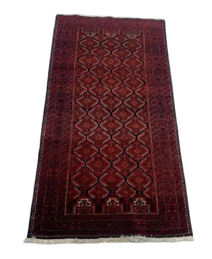 Scarlet and black Turkoman runner with diamond lattice