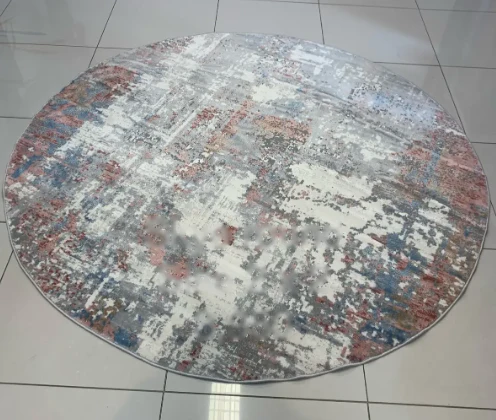 Round abstract multicolour rug in blush, blue and cream