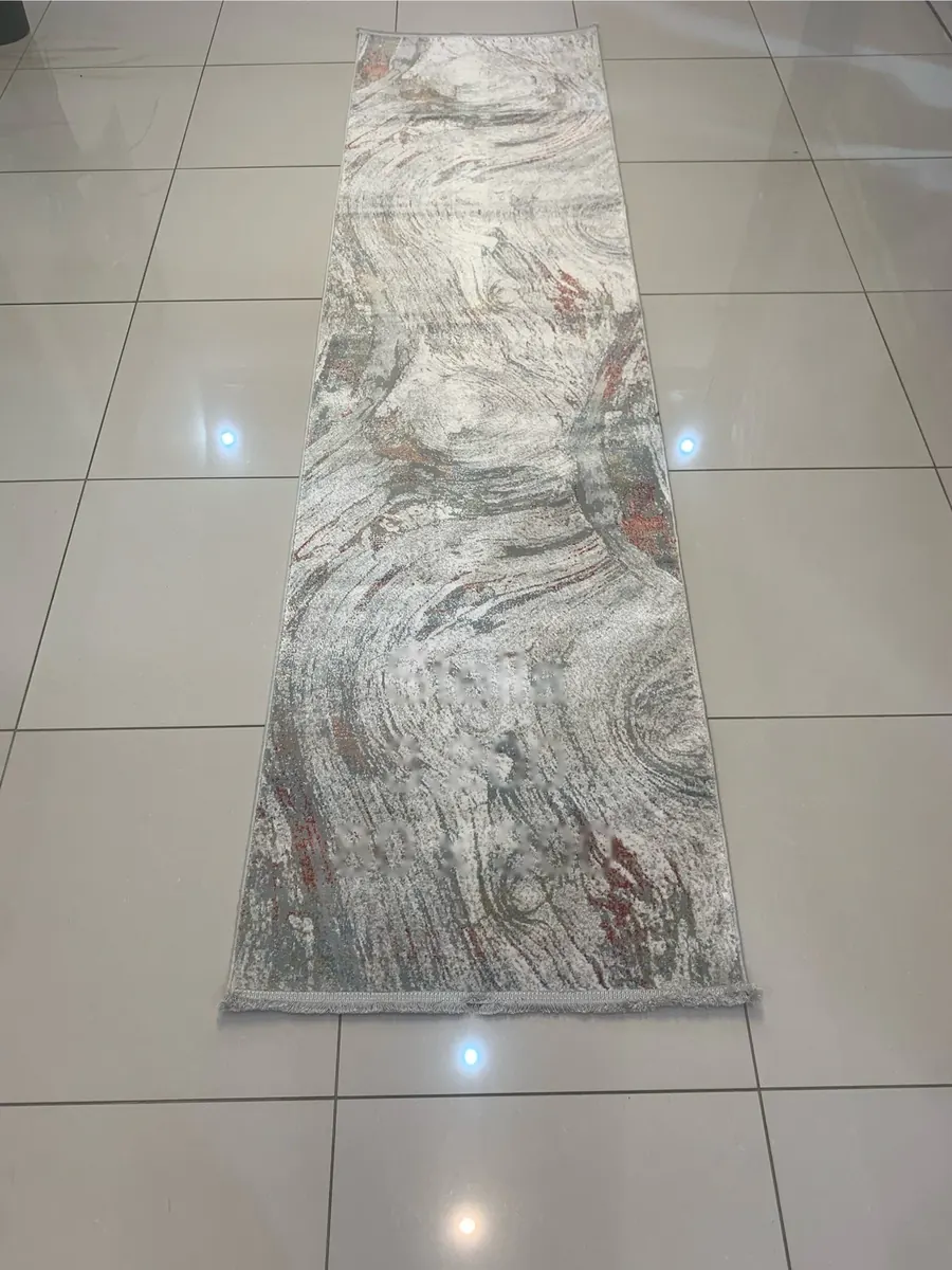Stella machine-made runner rug with blue and white marbled pattern
