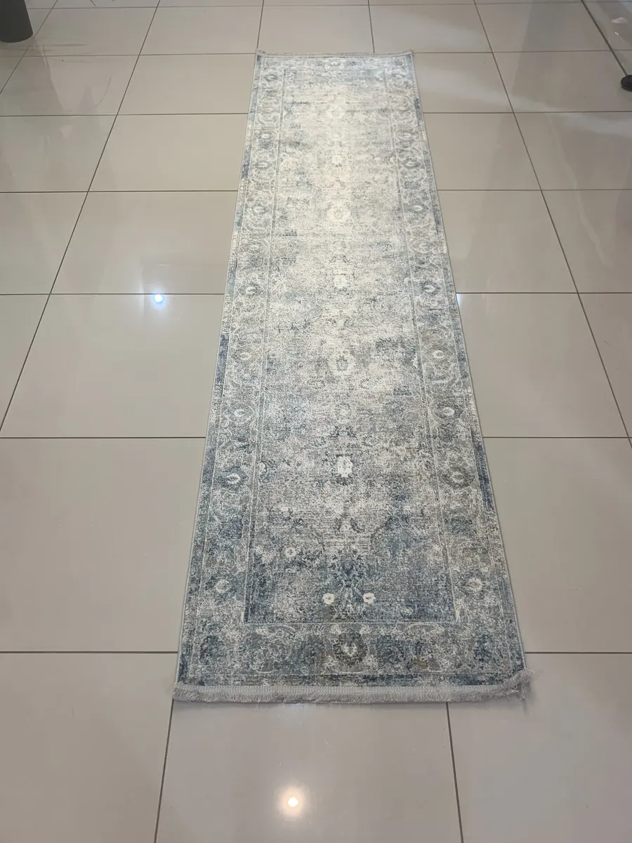 Stella machine-made runner rug with grey and blue vintage medallion pattern