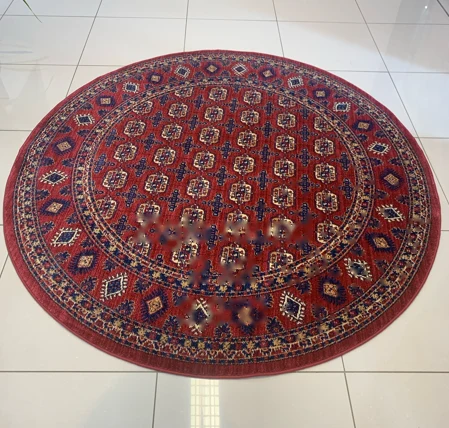 Round red oriental Bokhara-style rug